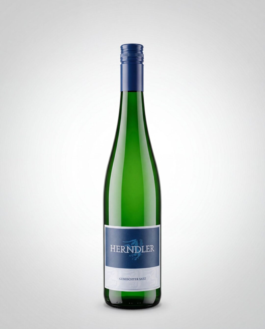 Tall green wine bottle with a blue foil cap, centered against a light gradient background. The label is blue with white text.