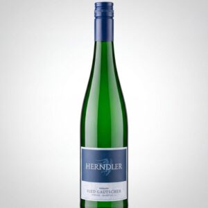 Tall green wine bottle with a blue label reading HERNDLER, standing upright against a light gradient background.